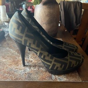 Fendi size 37 1/2. Good condition. Some scuffs visible in pictures
